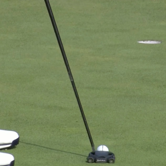 Using a Line on the Golf Ball to Line Up Putts